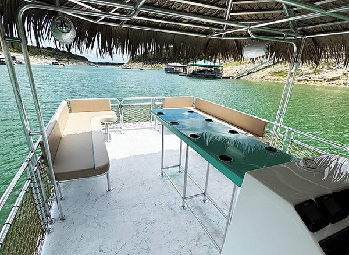 Inside a tiki vibes party boat on Lake Travis