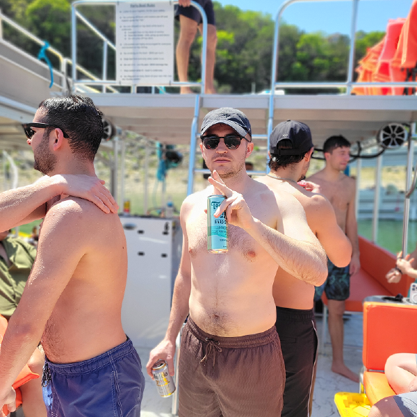 Group picture from bachelor party boat - Keep Austin Wet Boat Rentals